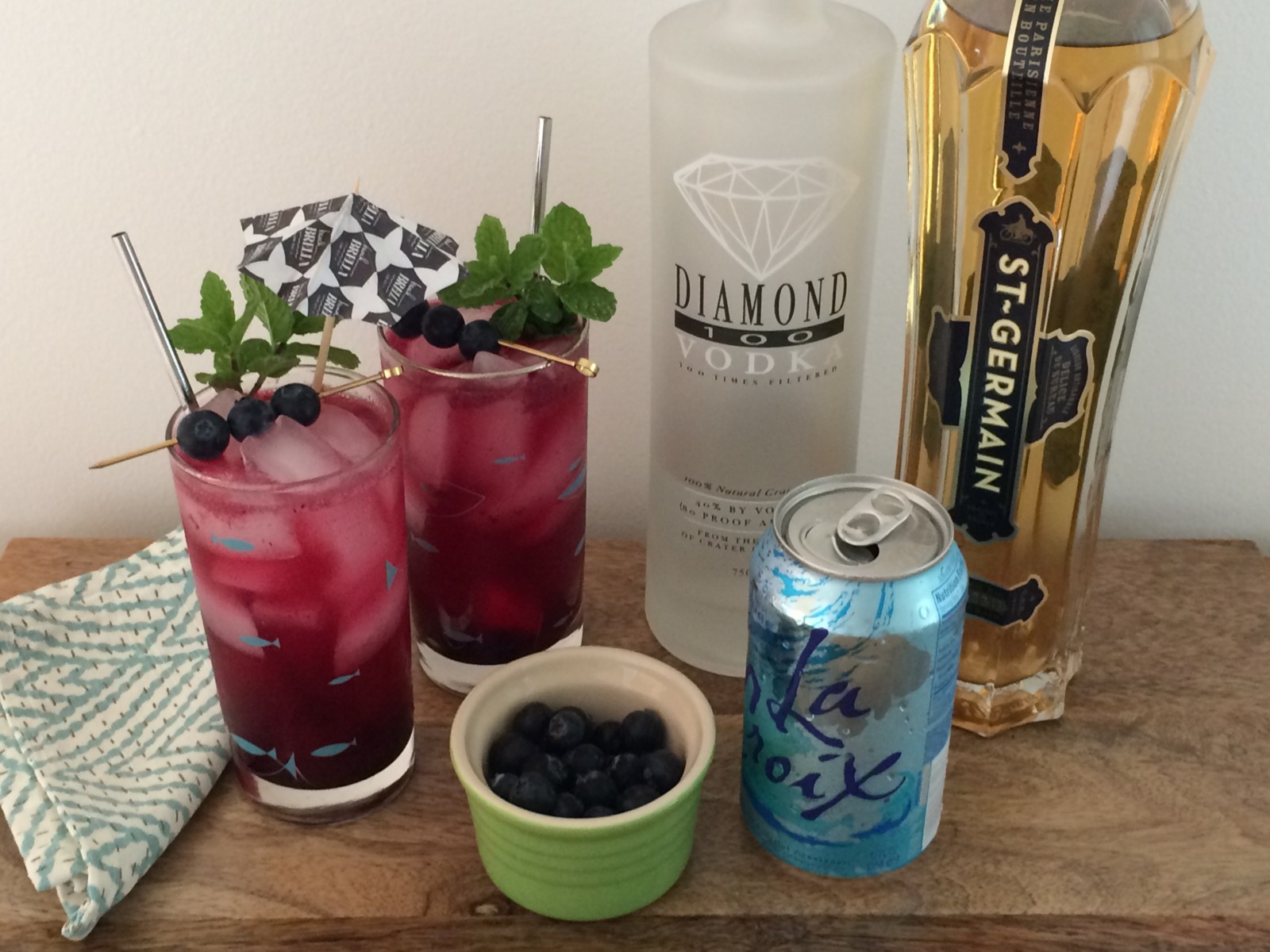 Two glasses of Spiked Blueberry Soda