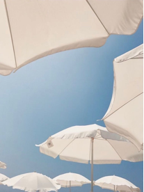 white beach umbrellas