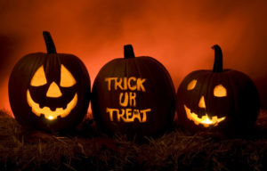 three pumpkins during Halloween time