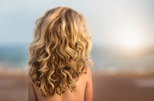 Girl with curly blonde hair